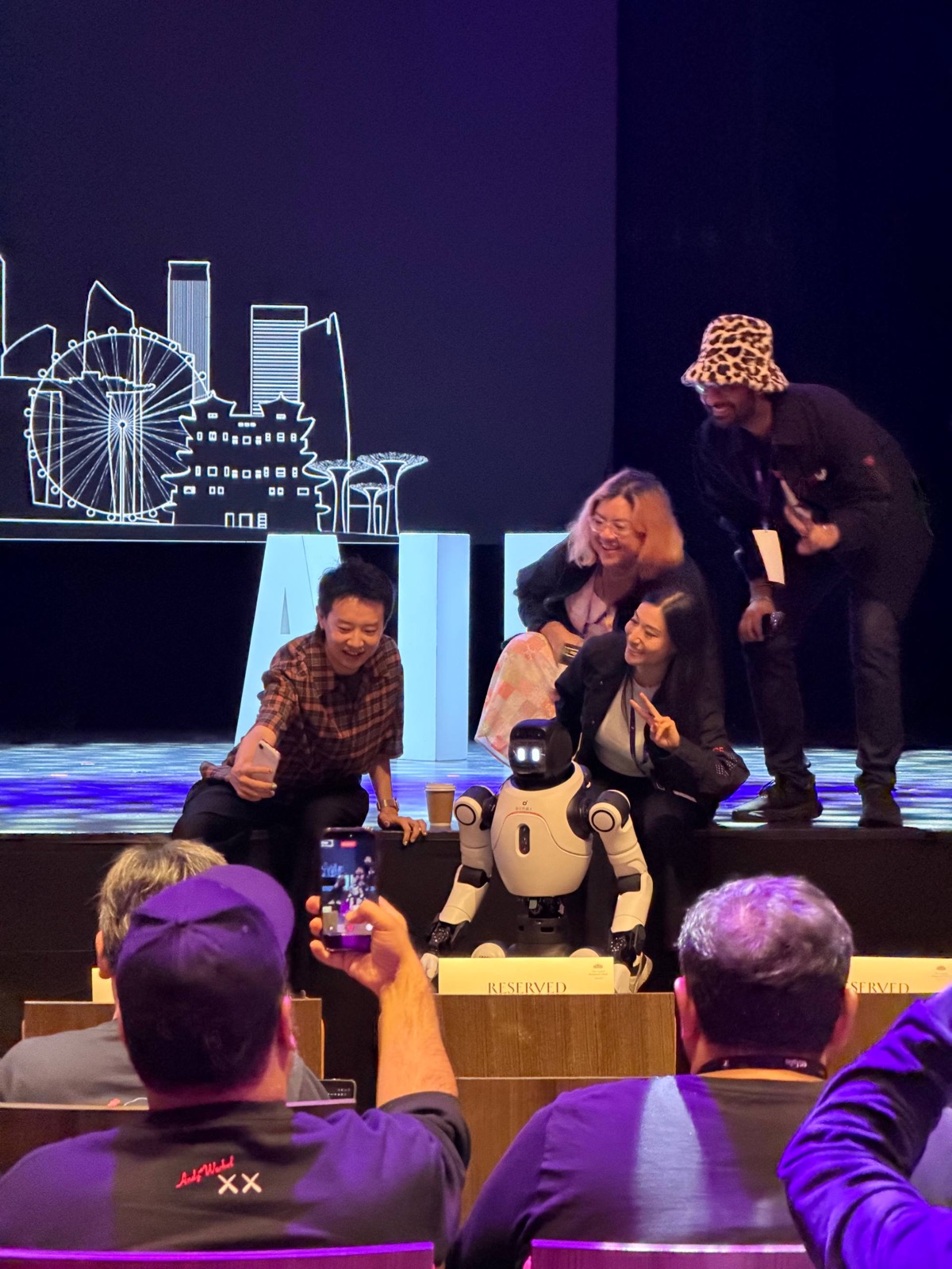 A small robot demonstration on stage at AI Engineer Singapore